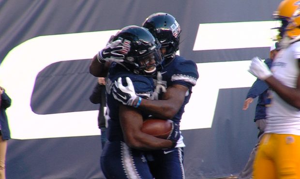 Utah State running back Darwin Thompson celebrates a touchdown against San Jose State on November 1...