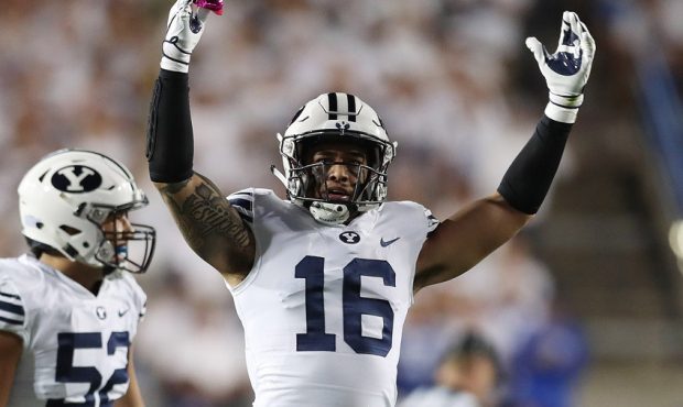Brigham Young Cougars linebacker Sione Takitaki (16) celebrates a stop against the California Golde...