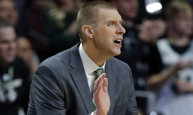 Utah Valley coach Mark Pope yells encouragement to his team during play against Grand Canyon in the...
