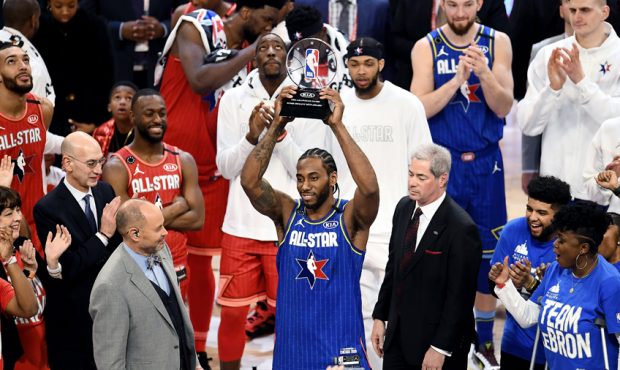Kawhi Leonard #2 of Team LeBron celebrates with the trophy after being named the Kobe Bryant MVP...