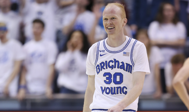 Brigham Young Cougars guard TJ Haws (30) smiles after getting called for a foul against the San Die...