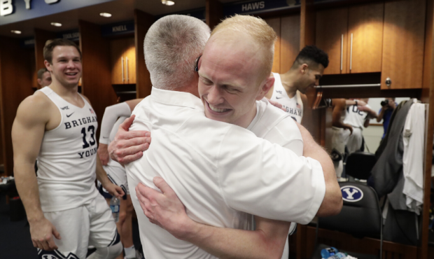 TJ Haws celebrates BYU's win over Saint Mary's in postgame locker room on Saturday, February 1st, 2...