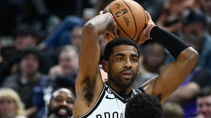 Kyrie Irving of the Brooklyn Nets faces off against the Utah Jazz...