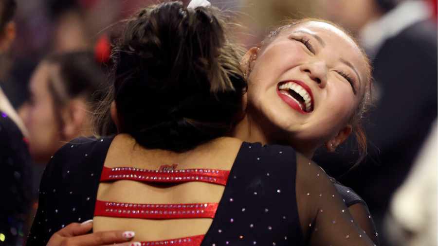 Kara-Eaker-Hugs-Teammate-After-Earning-Perfect-10...