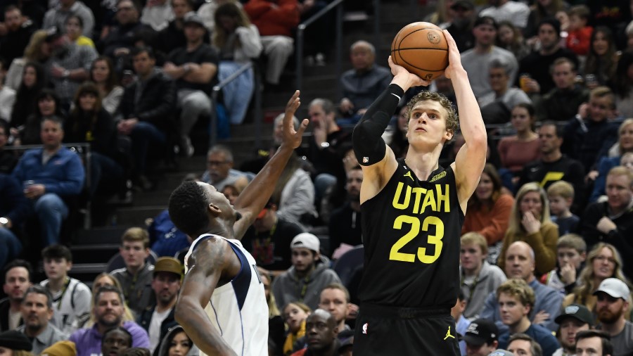 Utah Jazz forward Lauri Markkanen shoots against the Dallas Mavericks...