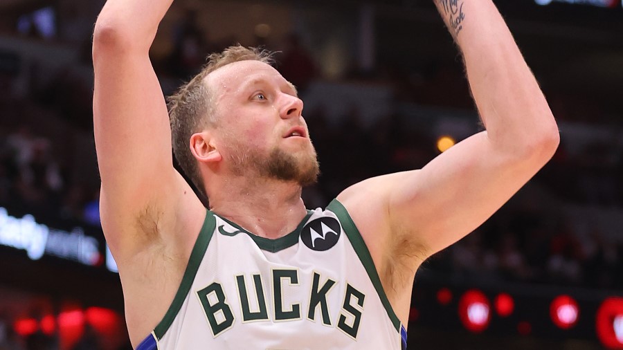 Joe Ingles #7 of the Milwaukee Bucks shoots a three pointer....