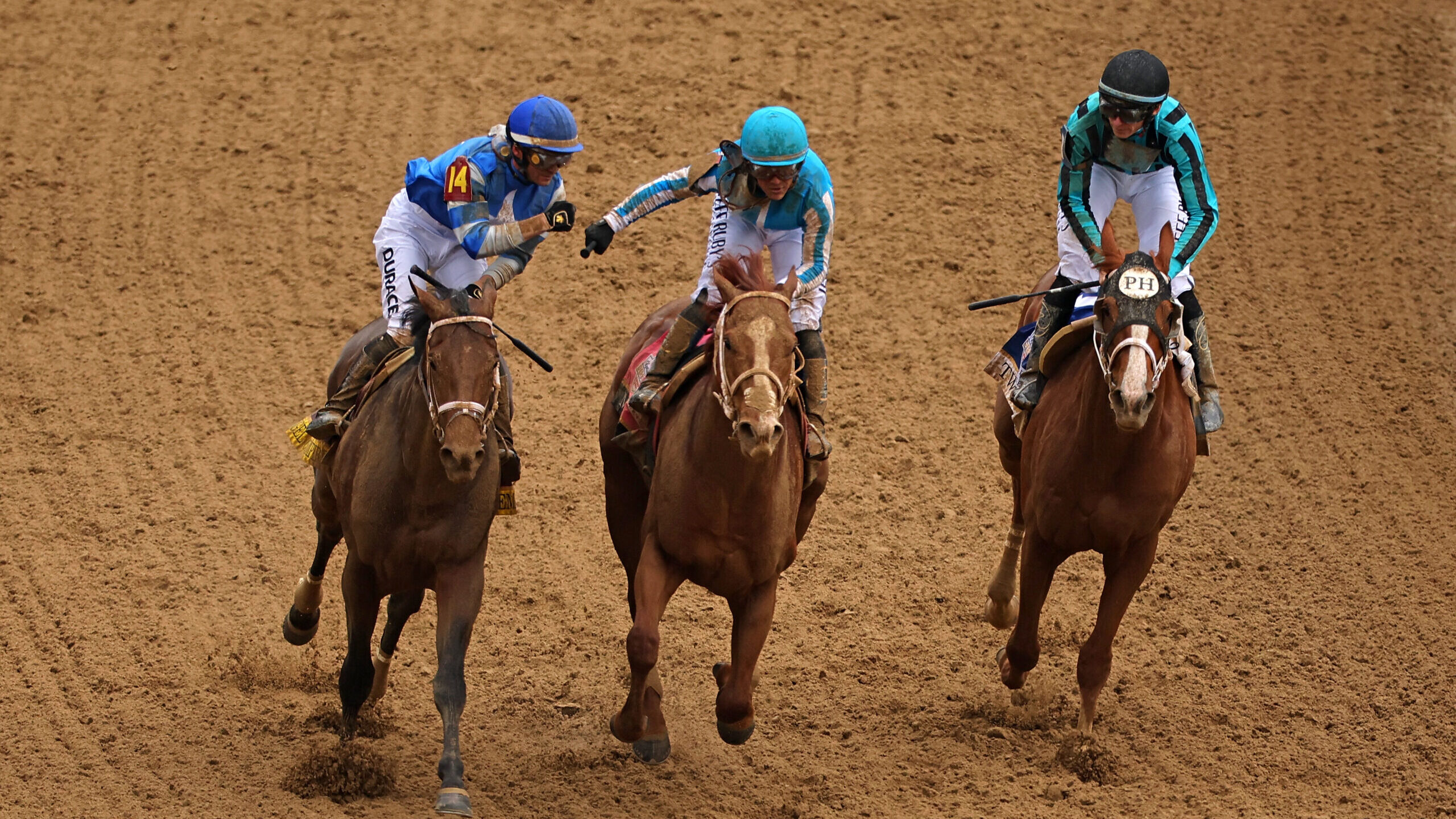 LOUISVILLE, KENTUCKY - MAY 06: Jockey Javier Castellano atop 
of Mage #8 is congratulated by jockey...