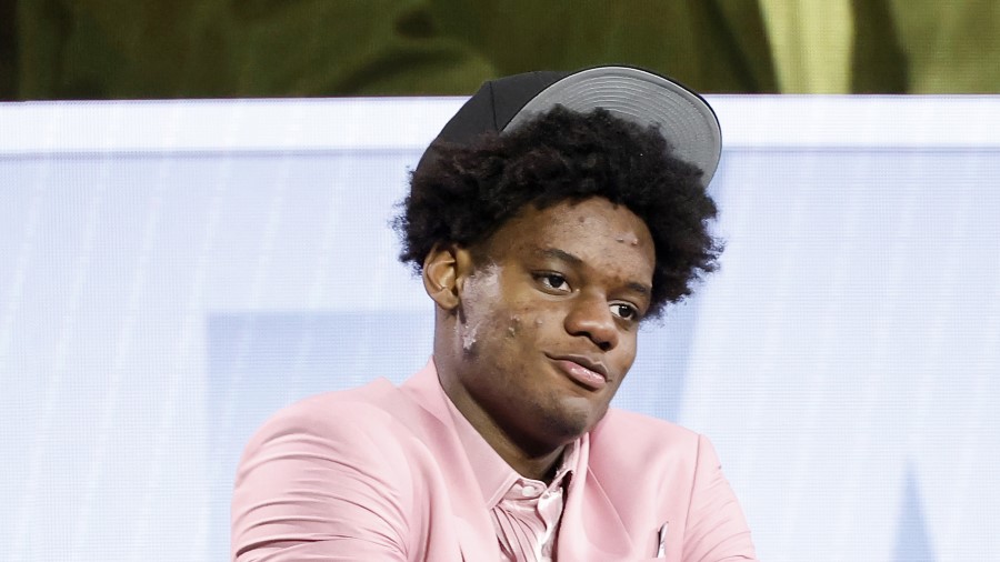 Taylor Hendricks celebrates after being drafted ninth overall pick by the Utah Jazz during the firs...