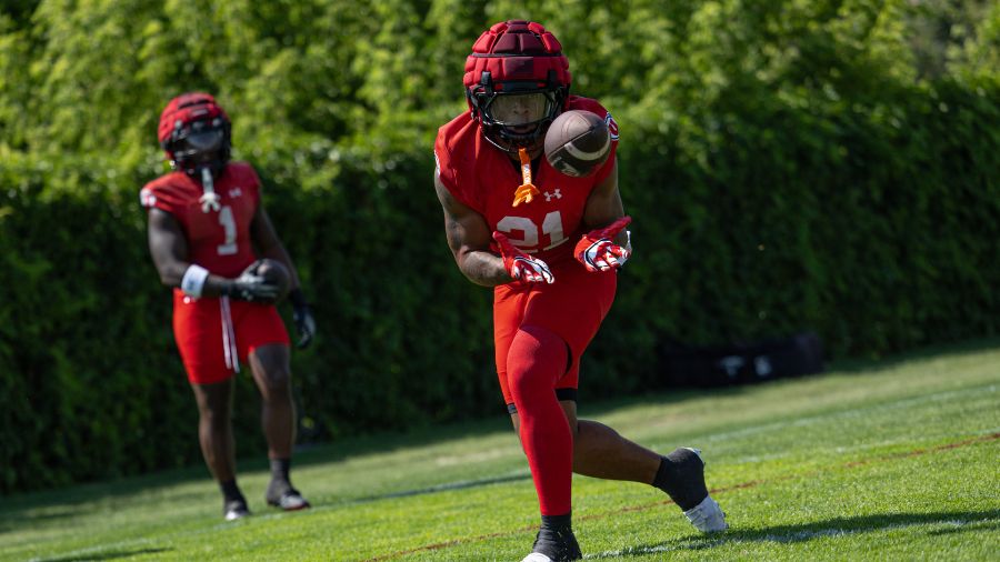 Utah running back Mike Mitchell...