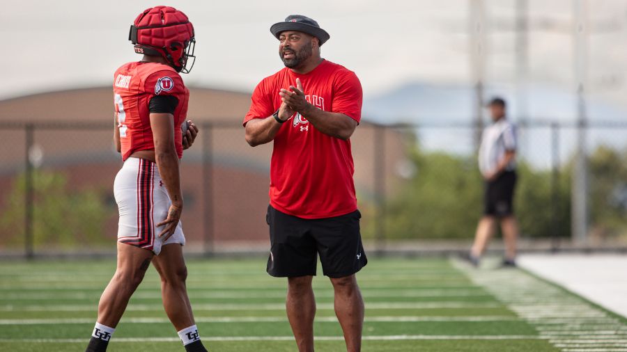 Utah Football running backs coach Quinton Ganther...
