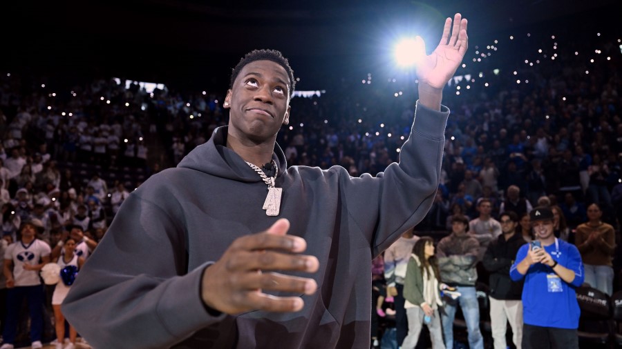 AJ Dybantsa, the nation's No. 1 basketball recruit, is presented at halftime of the BYU and Fresno ...
